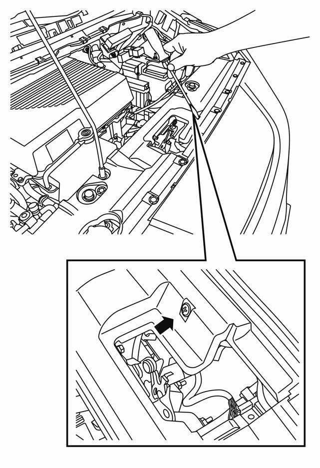 c. Using a flat head screwdriver (or suitable tool), insert into the screw located through the access hole near the front of the hood lock. d.