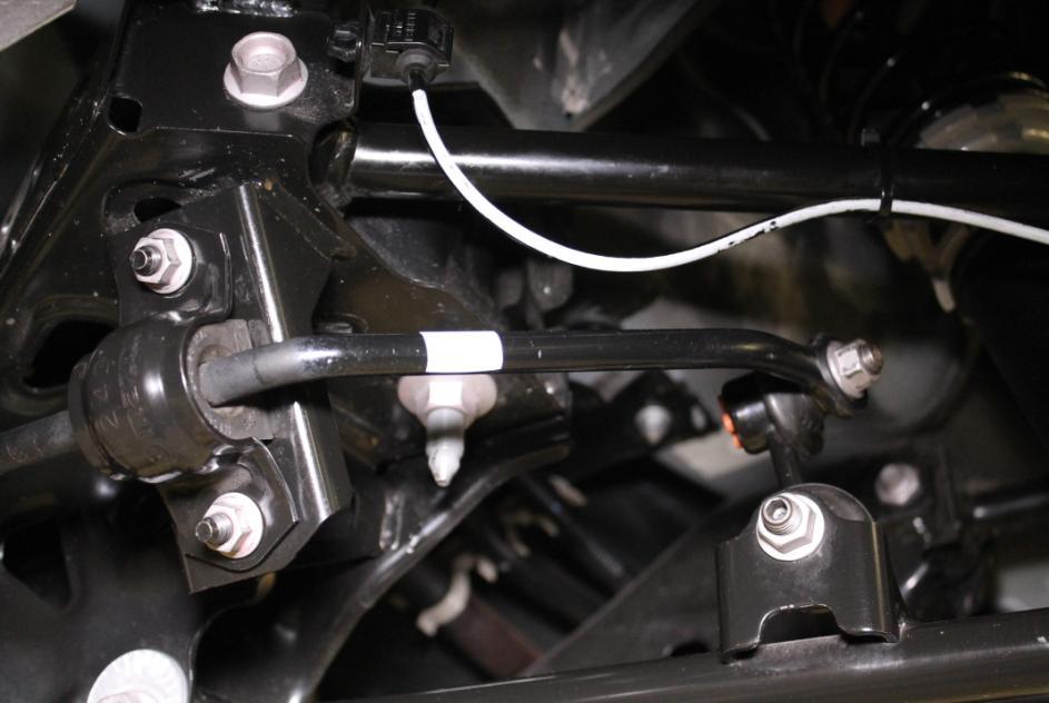 Page19 1. Using a 14mm socket, remove the two nuts securing the OEM sway bar to the endlinks.