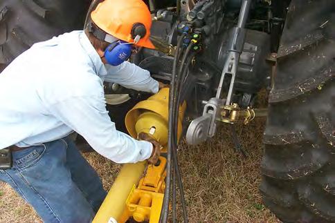7. DRIVELINE ATTACHMENT The driveline yoke and tractor PTO shaft must be dirt free and greased for attachment.