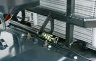 tools The front axle lubrication points are located in front of the radiator assembly for optimum accessibility.