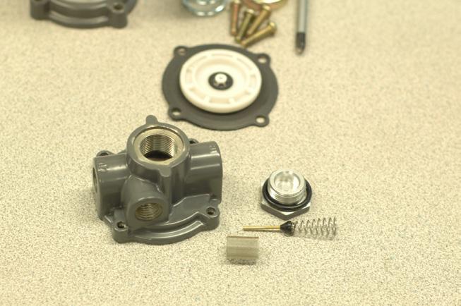 Remove all spring pressure by turning the Handwheel (1) counter clockwise. 2. Remove Qty. 4, screws (17) holding the Spring Case (2) and the Body Assembly (1) together.