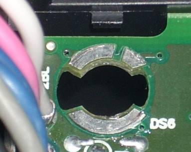 Note that the LED has an orientation that must be followed when inserting it in the socket. The slots on either side of the LED socket are different sizes.