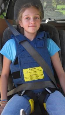 Installation of Occupant in Positioning Vest, Cont. NOTE: Verify that the lap and shoulder belt portions of the vehicle s lap and shoulder belt are positioned as shown in Figure M.