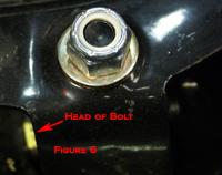 Next, slide the shock into place. You may need to angle it as the bolt may catch on the frame pocket. If you angle the shock and still cannot get it through the frame pocket you have 1 of 2 options.