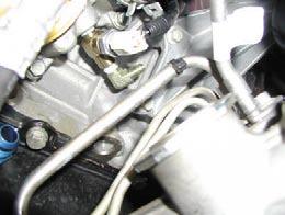 Locate the oil pressure sensor on the driver side of the engine. 9. Remove pressure sensor and set aside. 10.