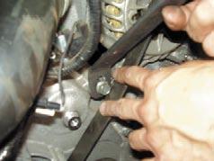 39. Now, bolt the turbo support strap to the