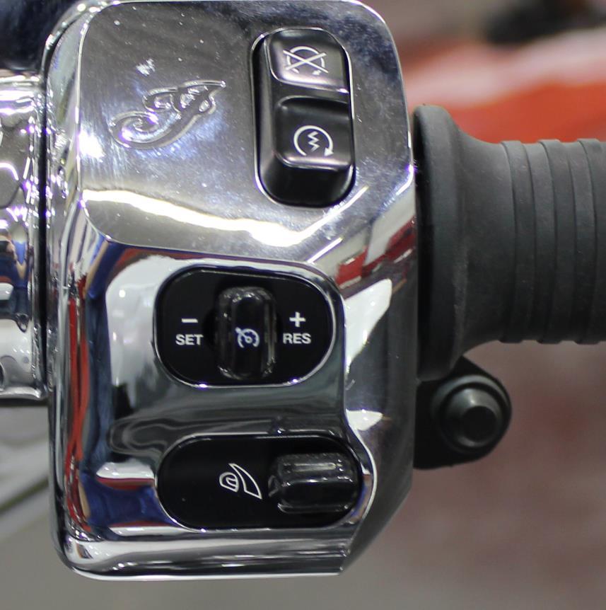 SWITCH BUTTON Figure 49: Position the switch just below the handlebar grip (right side shown, left side similar). b. Route the switch wires down the handlebars and under the fairing.
