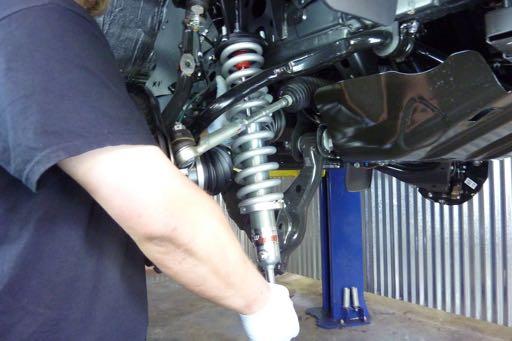 Note: The nut closest to the engine may require a box end wrench instead