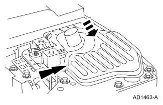 Install the fluid pan and gasket. 1. Position the transmission fluid pan with the gasket in place. 2.