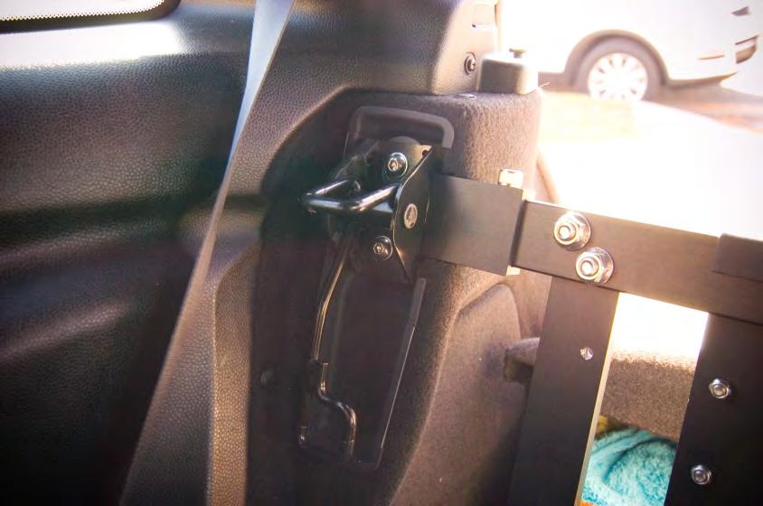 Install the seat latch bracket on top of the RCB and use hardware set #4 for bolting it in place.