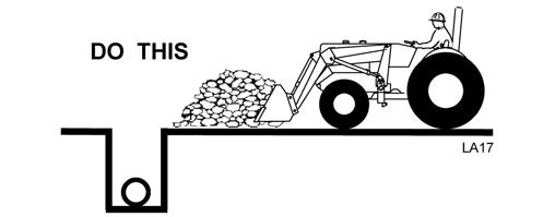 HANDLING OBJECTS WARNING Backfilling Figure 24. Bucket Tilted too Far 1. Approach the pile with a flat bucket, Figure 25.