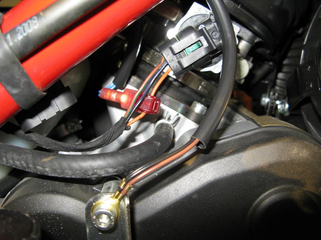 8. Locate the Throttle Position (TPS) which can be found on the right side of the throttle bodies.