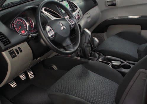 Comfort Interior shown withtextile mats, ashtray, sports pedals and leather shift knobs. Power socket For mounting in the loadbed or in combination with a bed liner.