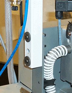 1. Install mounting post to feeder frame on the non-operator side of the folder. Drill (2) ¼ inch or 6.