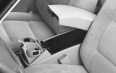 Front Storage Console (Option) On vehicles equipped with an armrest, the front armrest opens into a storage area.