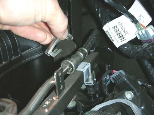Fuel system may be under pressure. Avoid open fl ames or any source of ignition.
