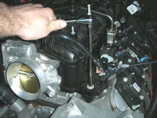 and remove the alternator from the vehicle. This will be re-installed later on.