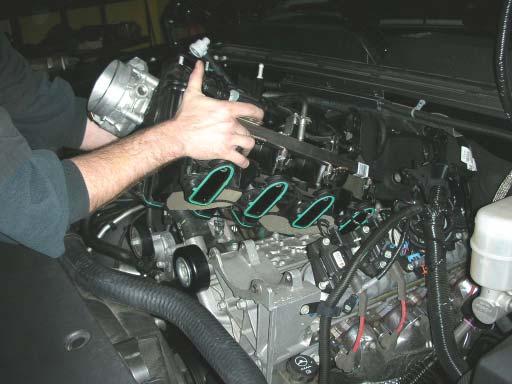 37. With all of the bolts removed, lift the intake manifold up and out of the
