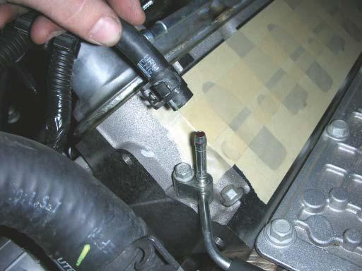 41. Remove the coolant hose from the vent pipe.