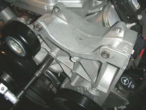 69. Next, re-installed the alternator/power steering bracket with all the