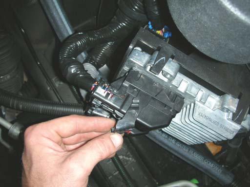 Once the battery is disconnected go ahead and remove the ECM (Engine Control Module) and the TCM (Transmission Control