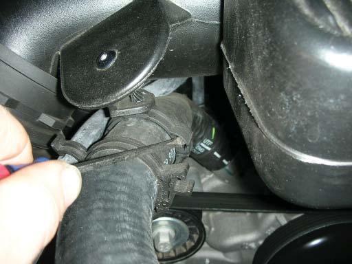 14. Remove the PCV vent hose from the passenger