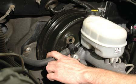 Remove the power brake hose from the control valve.