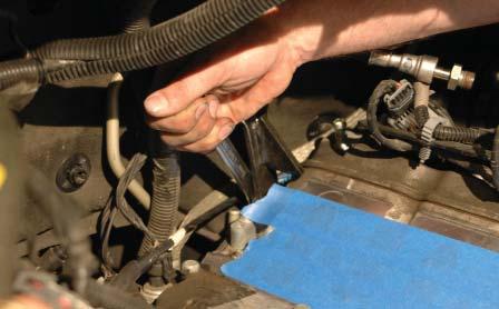 Cover the intake ports with tape or clean rags to keep dirt