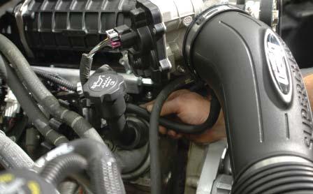 176. Push the bellows end of the air tube assembly on to the air box fi rst, and