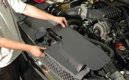 228. Replace the radiator cowl cover in position and secure using the OEM pushlock