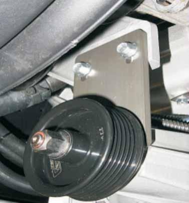 114. Install alternator on the stock bracket and torque