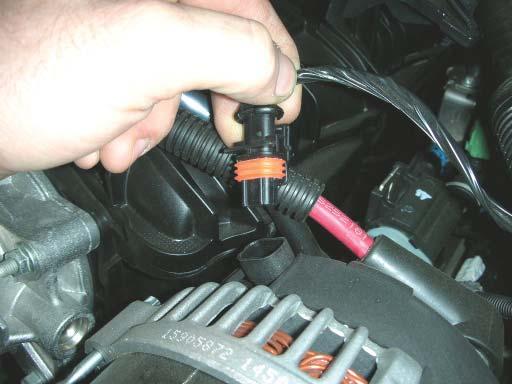 Remove the stainless steel safety clip from the fuel line. Do not discard. This will be reinstalled later on. 31. CAUTION!