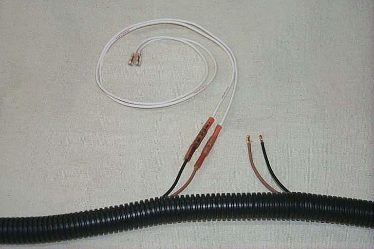 Cut the supplied white wire into two equal lengths and strip about ¼ off all ends.