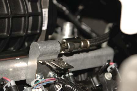 77. Install the tensioner assembly into the vehicle as shown. 78.