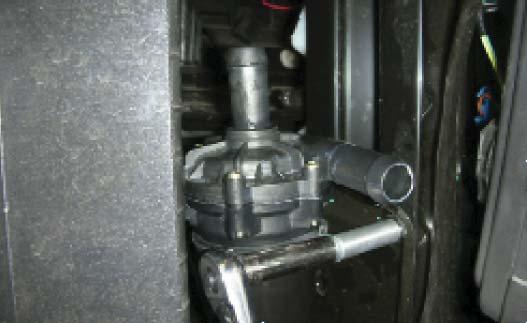 Locate the adel clamp, and put it on the intercooler pump, then using the 6mm x 55mm bolt