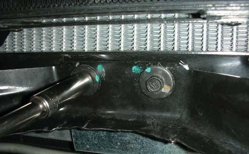 145. Using a 10mm socket wrench remove the two bolts located at the bottom of the A frame bracket. 146.