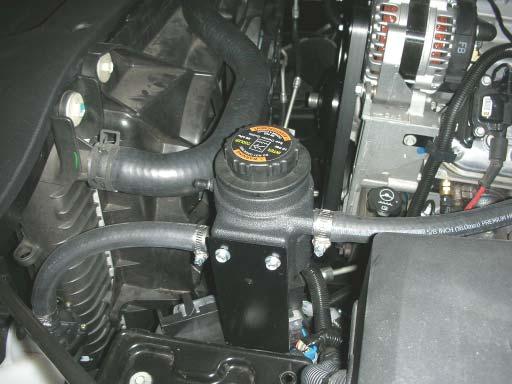 165. Refi ll radiator and intercooler system with a 50/50 mixture of coolant and distilled or de-ionized water only.