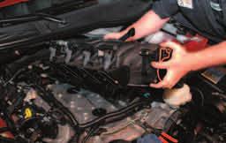 61. Remove the ten intake manifold bolts with a 8mm socket wrench.