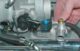 Install the ETC connector onto the throttle