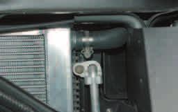 Route the large L hose through the area created by removing the air box boot.
