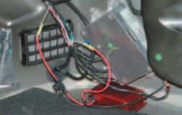 Connect the remaining large Red wire to the lower grey wire that runs to the fuel pump. To fuel pump Fused wire 208.