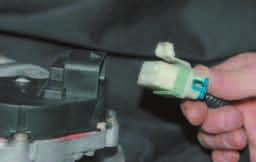 Disconnect the connector from the motor. 19.