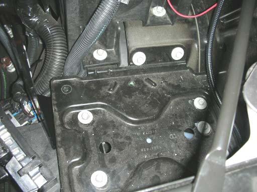 Using a 10mm socket wrench, re-install all bolts that were removed. 128.