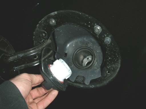 9. To relieve fuel pressure in the tank, remove the fuel