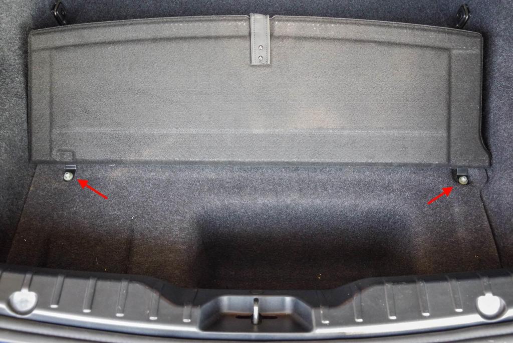 Step 1: Disconnect the battery s negative terminal in the trunk Unlock the vehicle and open the trunk and hood.