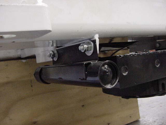Installing the cooler mounting brackets as shown in the picture below, and then using the mounting holes provided will