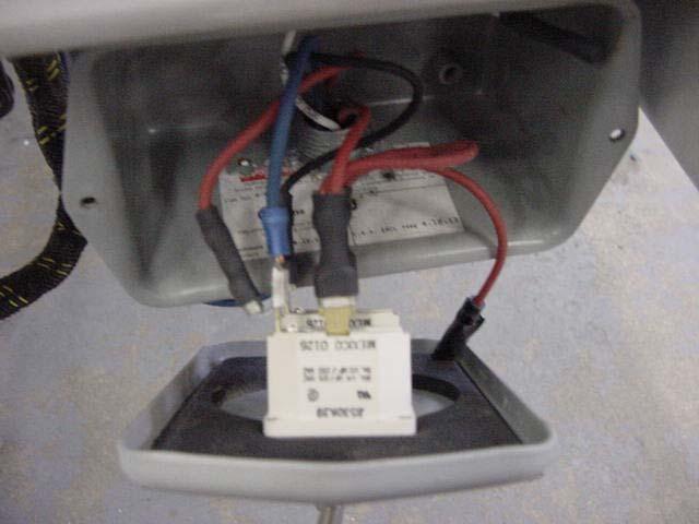 Loosen the strain relief on the JIC box containing the crane power switch.
