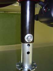 Remove the seat by lifting it straight up. 2. Set the seat aside. 3. Remove the bolt, nut, and washers that hold the seat post in the seat pedestal or ball detent pin. 4.