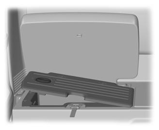 Slide it in the direction shown to remove the under seat storage cover. 2 1 E131745 1.