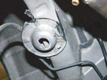 Place lower mounting plate (I) on axle (Figure 13). 5. Place bag assembly on top of lower mounting plate (Figure 14).